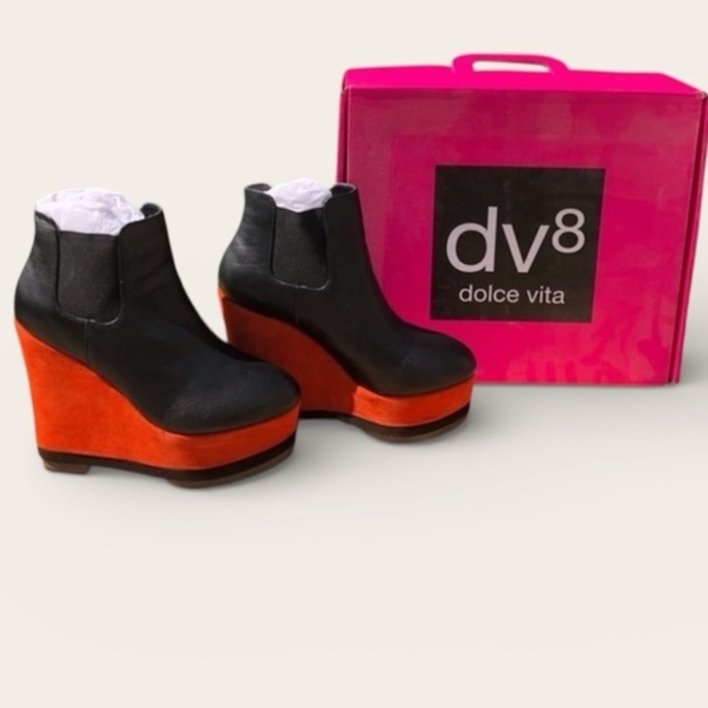 Chunky platform booths. Orange suede and black leather upper by Dolce Vita